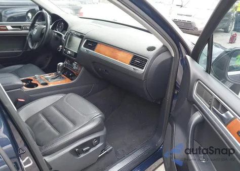 2011 Volkswagen Touareg Hybrid from USA, damaged, VIN WVGFG9BP4BD002121